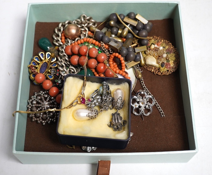 A collection of costume jewellery to include a gold bar brooch and a ruby and diamond pendant. Condition - a.f.